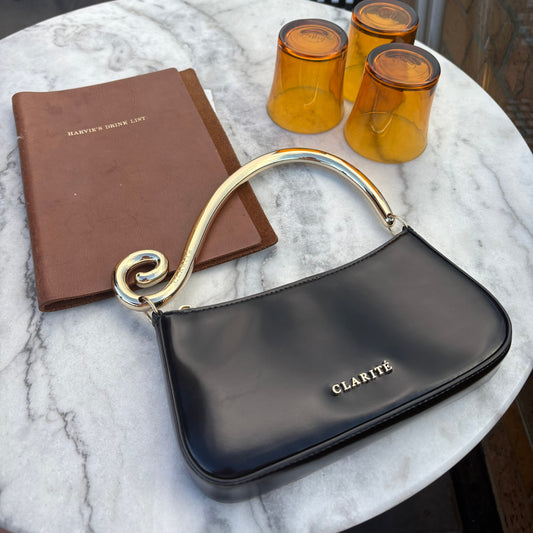 bag_clarite_Gold_and_Black_Evening_statement_big_gold_handle_swirl_detail_formal_cocktail_shiny